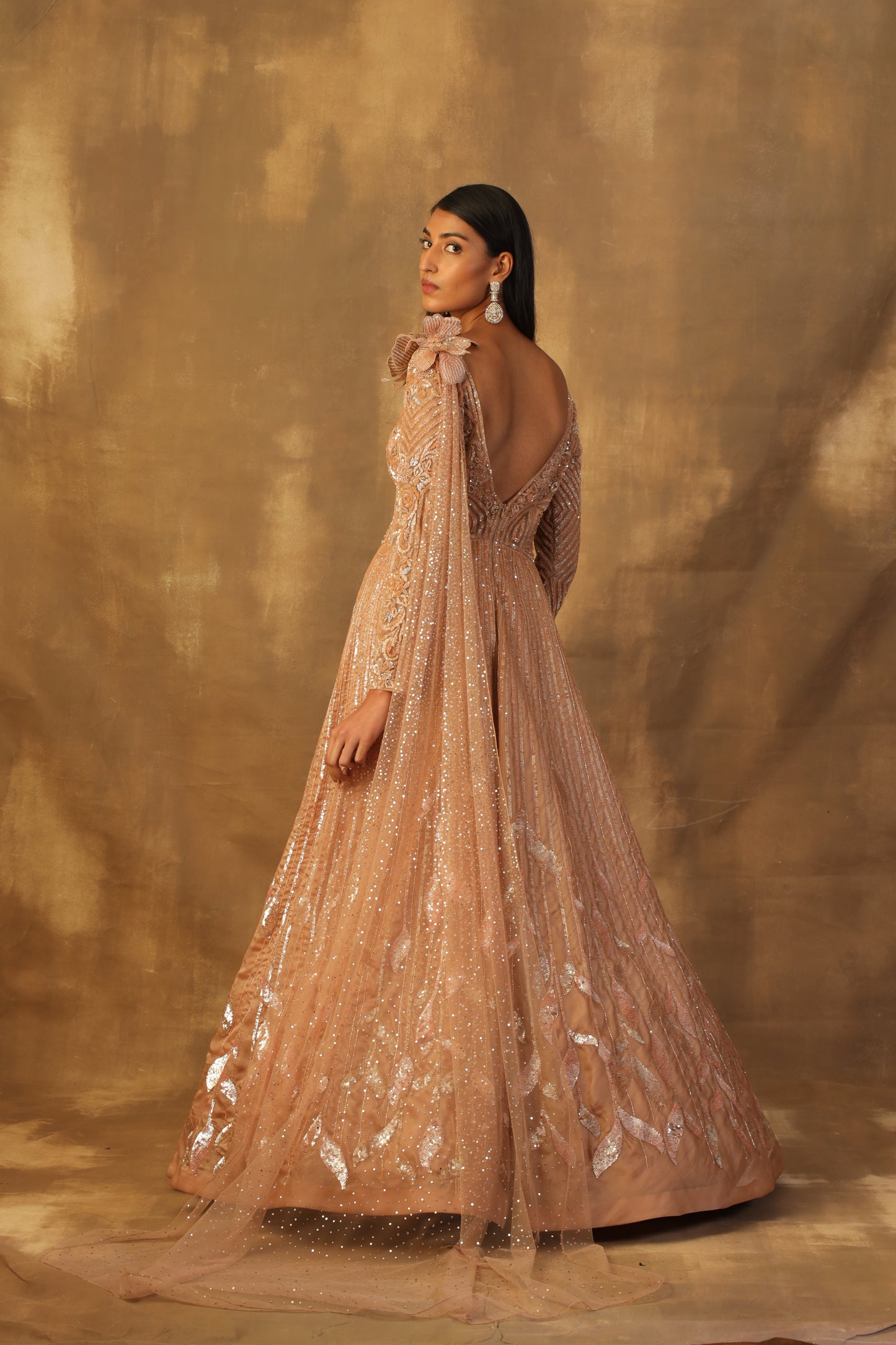 Dusty rose gold gown with veil