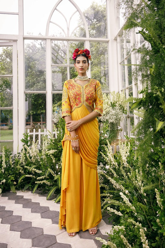 Silk blouse with asymetrical neck and waist line embroidered with multi colour thread