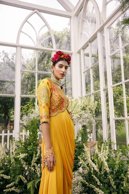 Silk blouse with asymetrical neck and waist line embroidered with multi colour thread