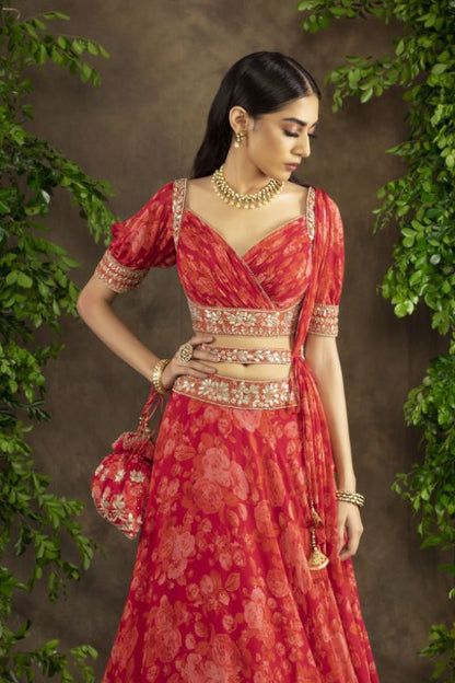 Fuchsia orange floral printed rooshing blouse and lehnga