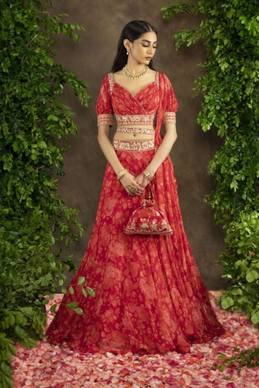 Fuchsia orange floral printed rooshing blouse and lehnga
